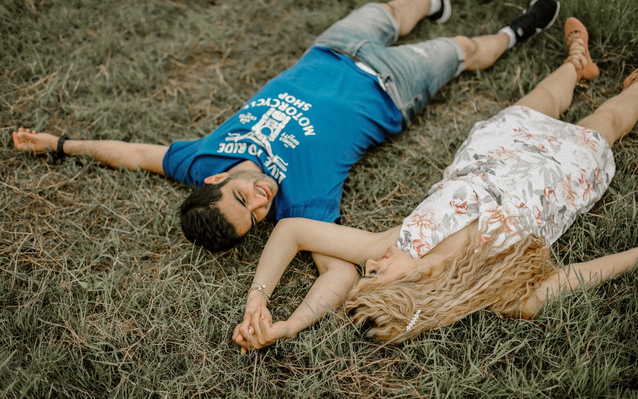 a man and woman lying down